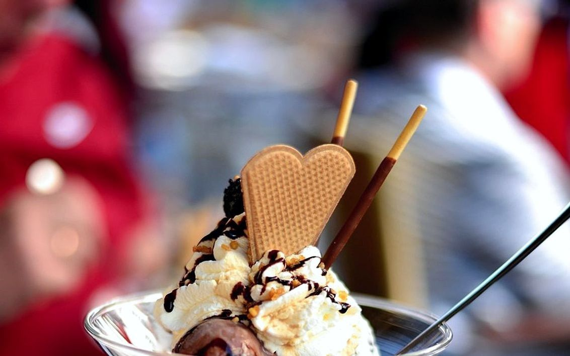 A rich dark chocolate gelato with a drizzle of warm caramel sauce